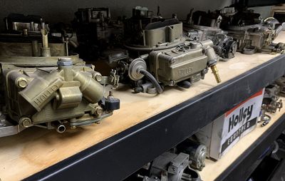 carburetors on shelf
